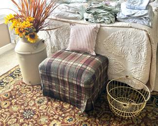 rug, lovely matelasse cover, linens, ottoman, wire basket
