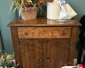 two door cabinet, crock