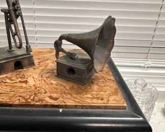 Antique pencil sharpener in the shape of a phonograph