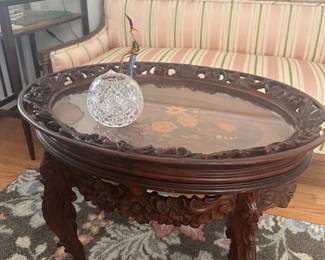 Heavily carved coffee table