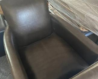 Two matching leather reclining chairs