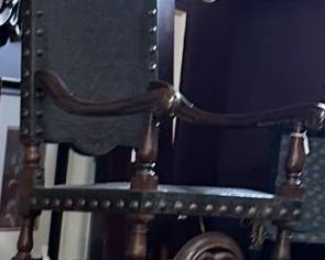 Old leather embossed chair - gotta see this in person