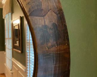 Detail on painted oval antique wooden mirror. 34” x 30”