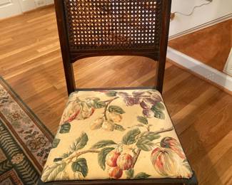 One of four antique side chairs with drop seats and original cane