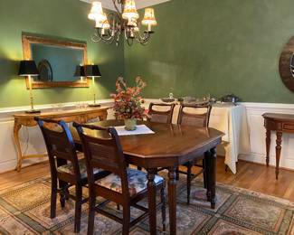 Lovely dining room with antique dining table and chairs