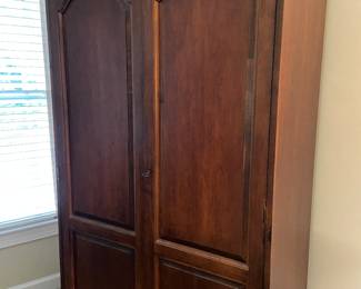 Armoire, with pull-out desk, used as a TV cabinet