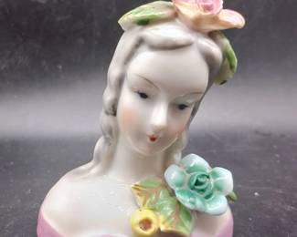 Head Adorned With Flowers Figurine