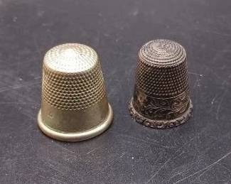 (2) Thimbles including Sterling Silver