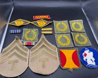 Military Patches
WW2 US Army CARIBBEAN DEFENSE COMMAND Patch Shoulder Sleeve Insignia WWII
Panama Canal Department White Back Patch WWII Vintage
(2) WWII era khaki uniform patches
(5) Meritorious Unit Commendation (MUC) patches
(2) Ruptured Duck" patch, officially known as the Honorable Service Lapel Patch or Honorable Discharge Emblem
Panama" tab, which was part of the uniform of the Panama Defense Force (PDF) during the Noriega era (1983-1989).
U.S. Army Overseas Service Bar
American Campaign Medal
Ribbon bar