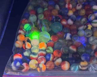 Marbles Shown In A Gallon Ziploc Bag