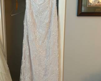 A couple of wedding dresses these look like they’re new because the tags are still on them and they’re real nice you thinking about getting married over the weekend well
