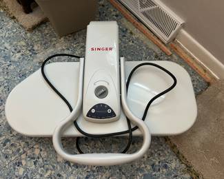 Singer, shirt ironing board unit