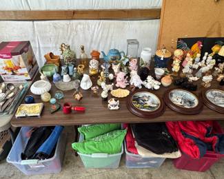 Old Avon bottles and decorative plates