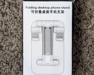 Folding desktop phone holder