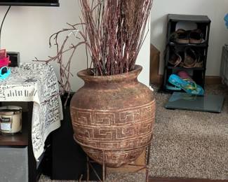Clay vase with stand and sticks