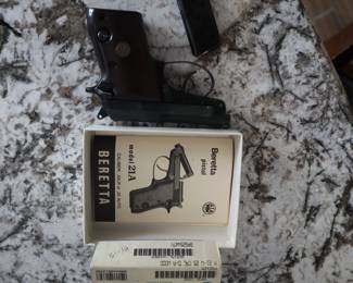 Beretta 21A Bobcat (.22LR/.25 ACP) – Includes original box, manual, and extra magazine.