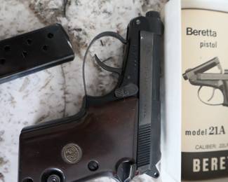 Beretta 21A Bobcat (.22LR/.25 ACP) – Includes original box, manual, and extra magazine.
