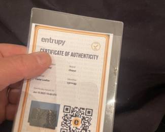 THE ENTRUPY AUTHENTICITY CERT THAT GOES W/ THE BAG