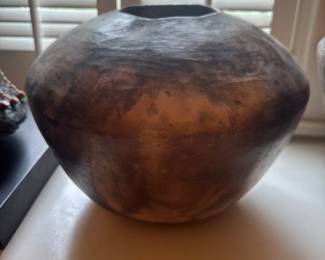 large rounded pottery vessel Raku or pit fired technique 