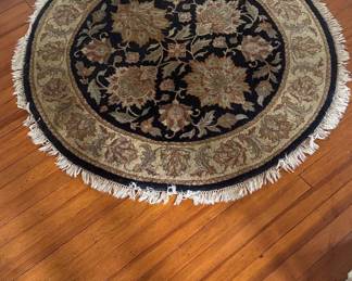 Round Knotted wool area rug 