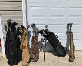 5 Golf Bags Full Of Clubs