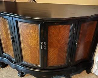 Black and brown wood curved cabinet