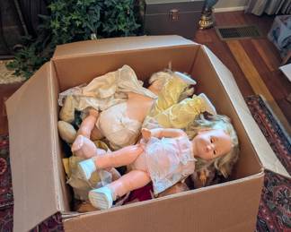 Box of vintage dolls, including chatty cathy's