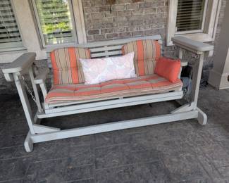 Wood patio glider.