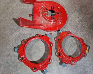 2 Red wedge action Mechanical joint restraint for pipes and 1 Norkar rotator