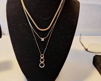 3 Gold Necklaces And 1 Set Of Earrings