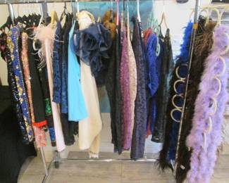 We have 77' of Hanging Racks & Closet Racks PACKED with Ladies Clothing, Many Styles, Colors & Patterns. Sized L/XL + Medium-Sized Items