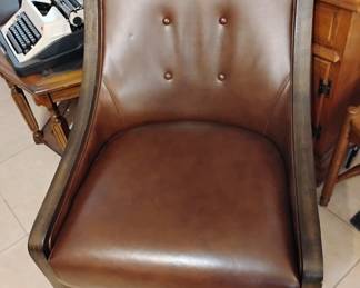 Brown leather lounge chair$100. two available