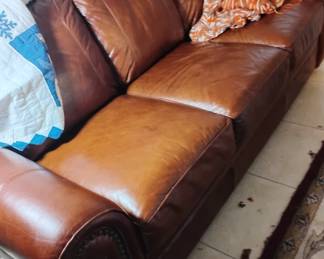 Chocolate amber leather sectional. Perfect condition and was always covered so not a scratch. Was $3000 new. Now only $400