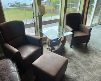 pair of comfy suede armchairs. 