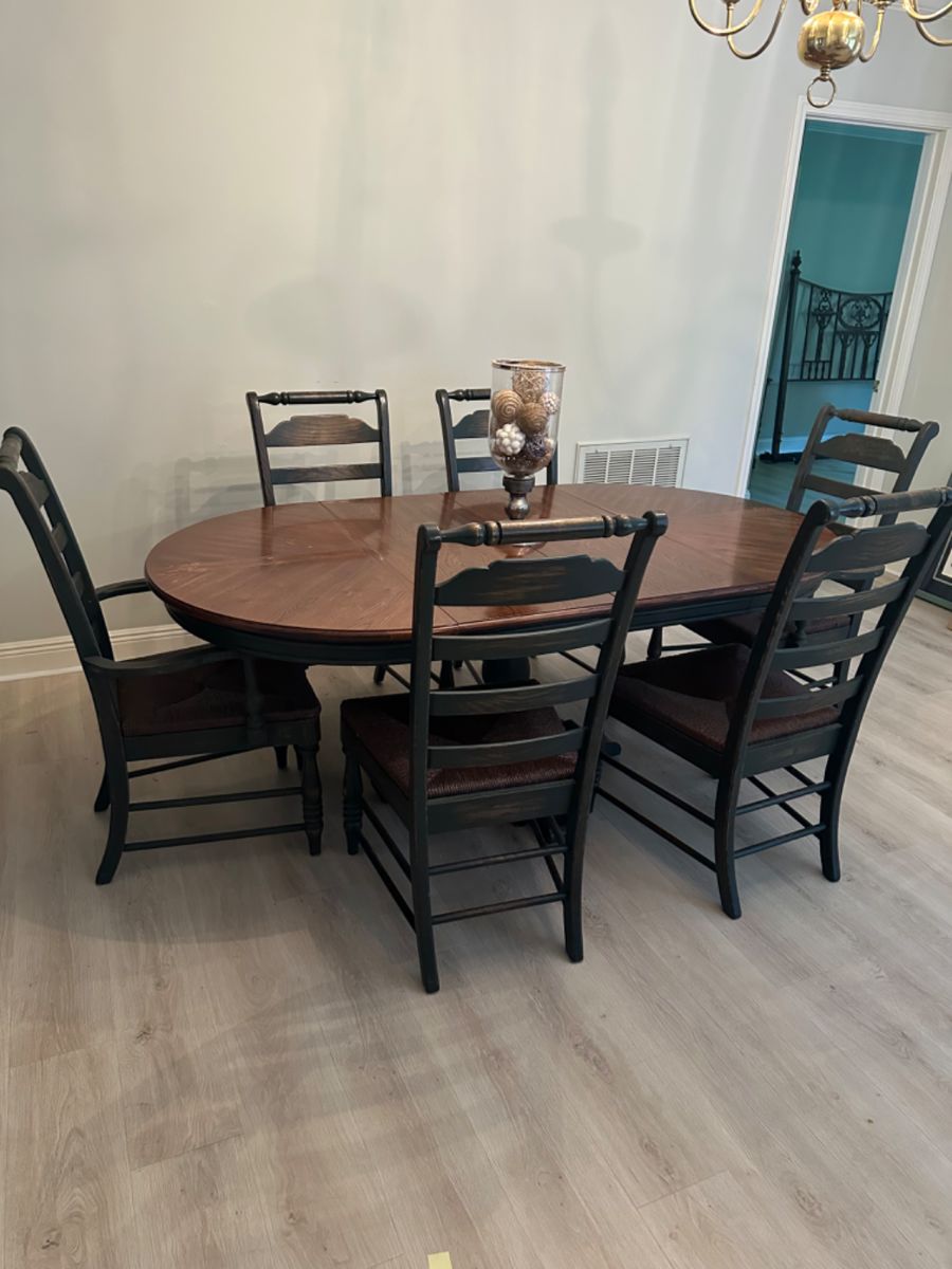 Dining Room Table with six chairs, has two leafs.