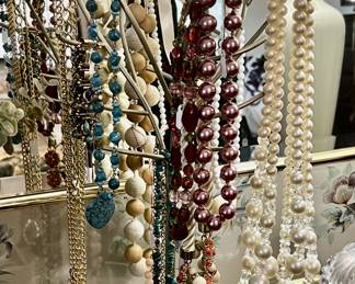 Assortment of fashion, jewelry, including necklaces, bracelets, rings, etc.