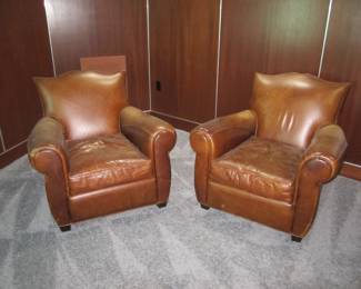 pair distressed leather club chairs