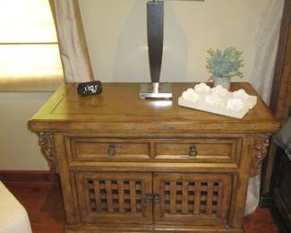 ornately carved night stand