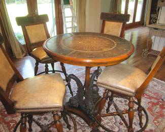 5 piece bistro set with mahogany finish table w/dolphin base and 4 swivel leather studded stools