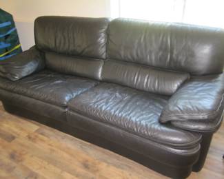 black distressed leather sofa
