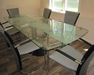 7 piece chrome & glass dining set w/3 piece glass top and leather upholstered chairs