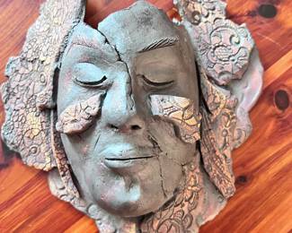 Pottery face mask wall hanging art
