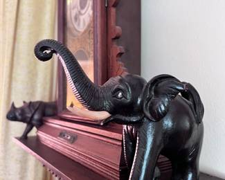 Wood carved elephant and rhino