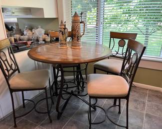 Bar height kitchen table with four chairs
