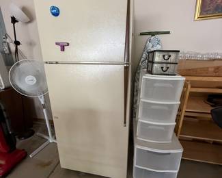 33. Kenmore Refrigerator with icemaker; plastic storage containers