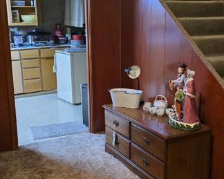 Basement stairway will be on your right as you enter the house, right next to the garage doorway.