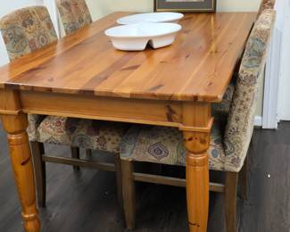 all wood table with 4 upholstered chairs