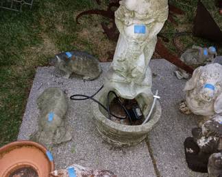 Nice cement fountain
Doesn't work but nice statue