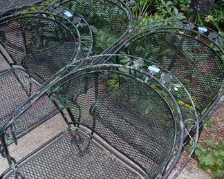 Several assorted metal chairs