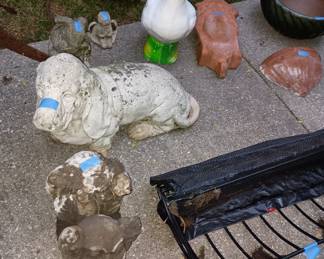 Assortment of cement animals